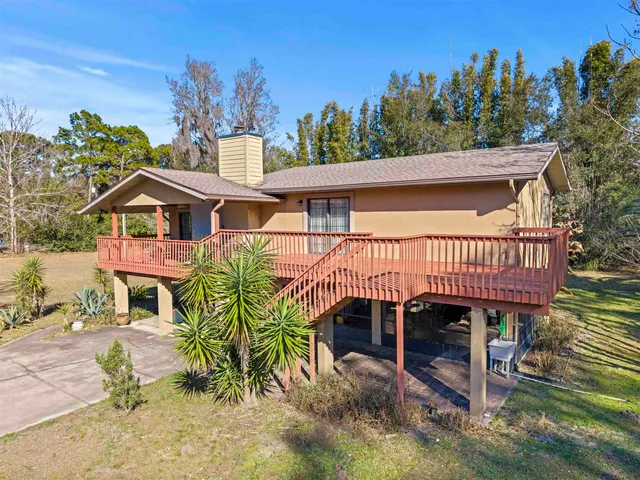 a view of a trees in front of a house