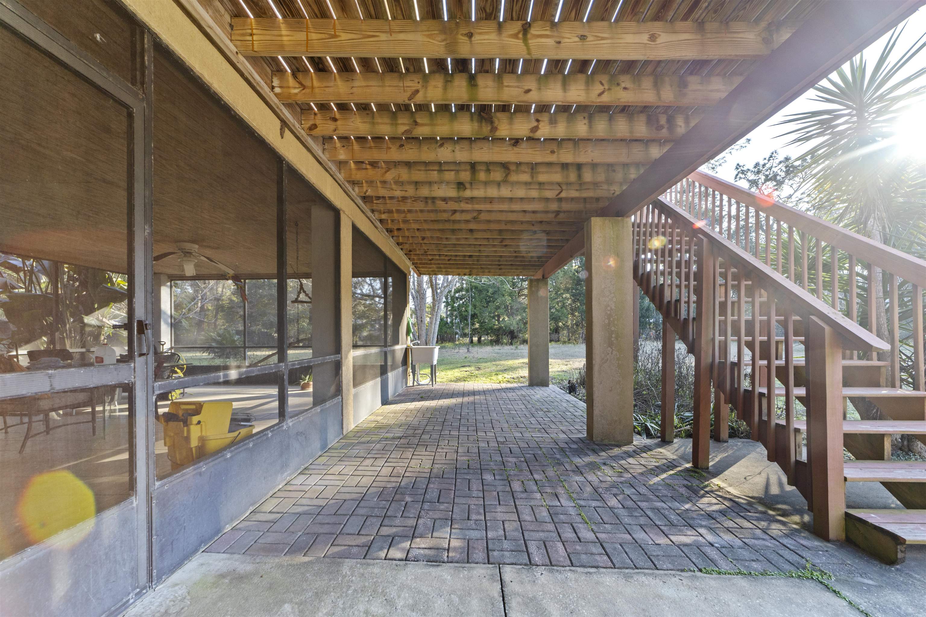 545 Ray Edwards Road St. Augustine, FL 32086 - Photo 54 of 78 View of patio / terrace with stairway