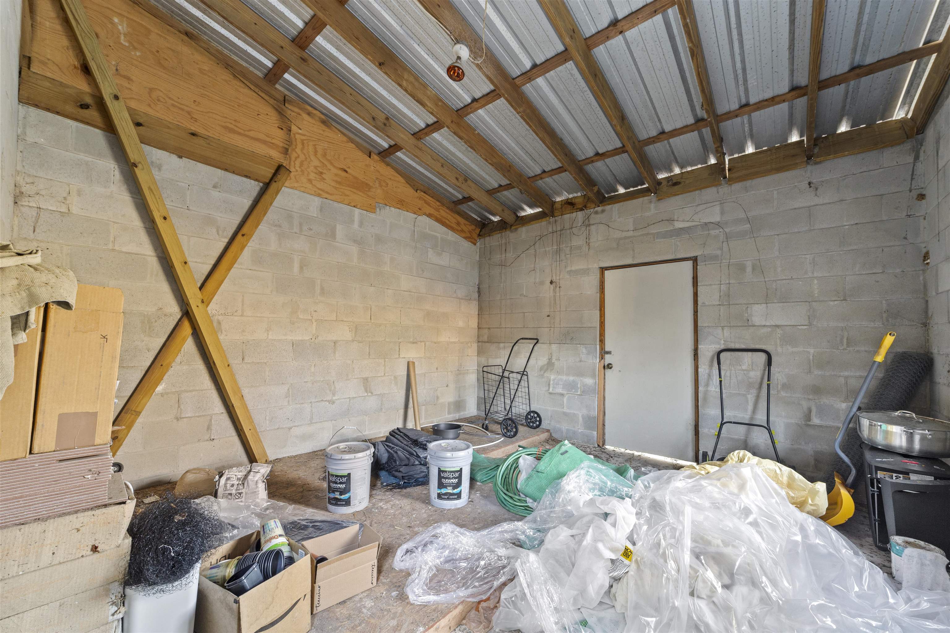 545 Ray Edwards Road St. Augustine, FL 32086 - Photo 61 of 78 Garage with concrete block wall