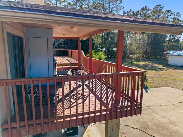 a view of a tree with a yard