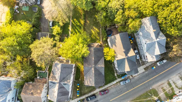 a view of swimming pool with sitting area