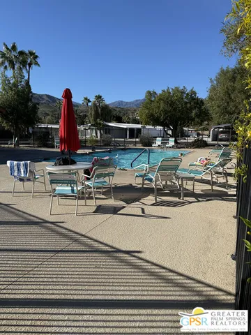 a view of a street with a garage