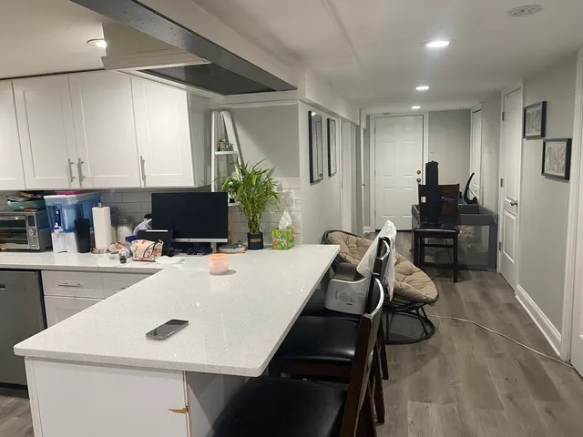 a view of a kitchen and dining room