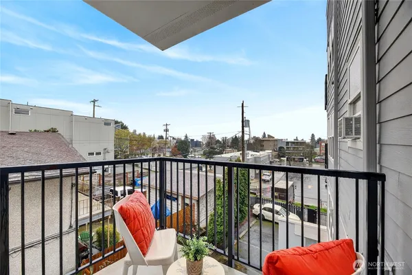 a view of balcony with furniture