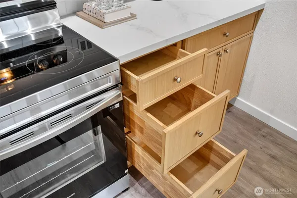 a view of kitchen stove and microwave