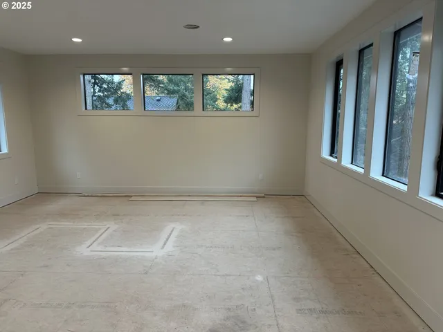 an empty room with windows