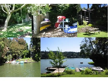 a view of swimming pool with lawn chairs and plants