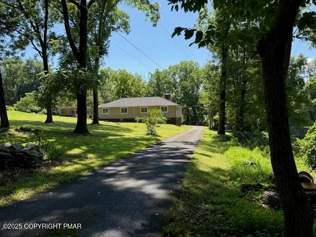 a living room with a couch and a fireplace