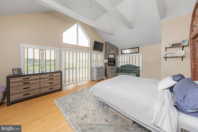 a bed room with a bed and a dresser