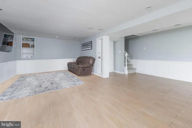 a view of kitchen and empty room