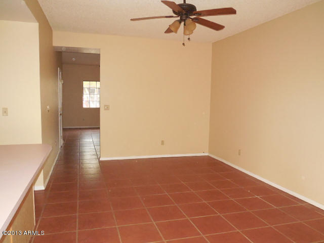 170 East Guadalupe Road, Unit 148 Gilbert, AZ 85234 - Photo 25 of 29 a view of an empty room with a window