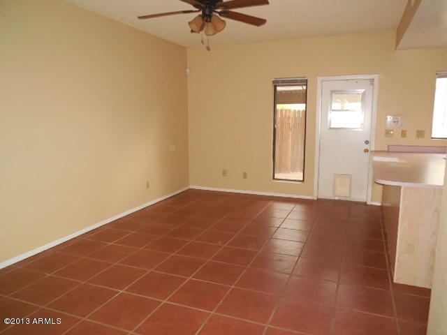 170 East Guadalupe Road, Unit 148 Gilbert, AZ 85234 - Photo 28 of 29 a view of an empty room with a window