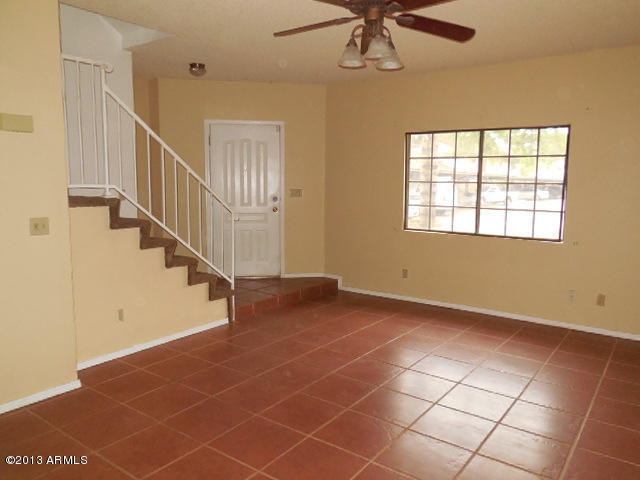 170 East Guadalupe Road, Unit 148 Gilbert, AZ 85234 - Photo 3 of 29 023-283542 - Living Room and Front Door
