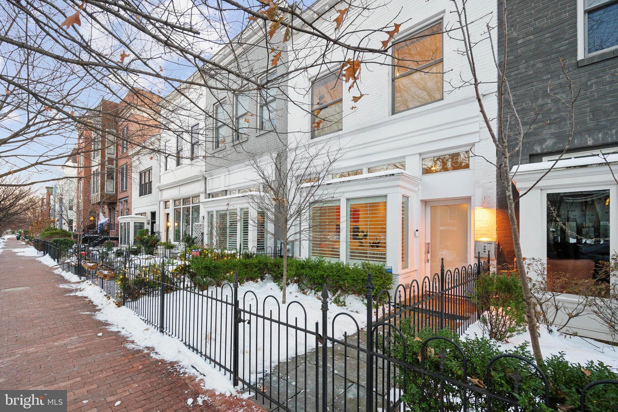 1325 Constitution Avenue Northeast Washington, DC 20002 - Photo 2 of 36 a front view of a house with a yard