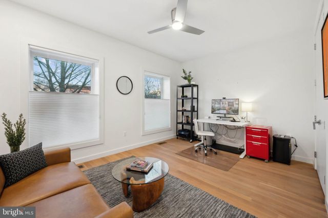 a room with furniture and wooden floor