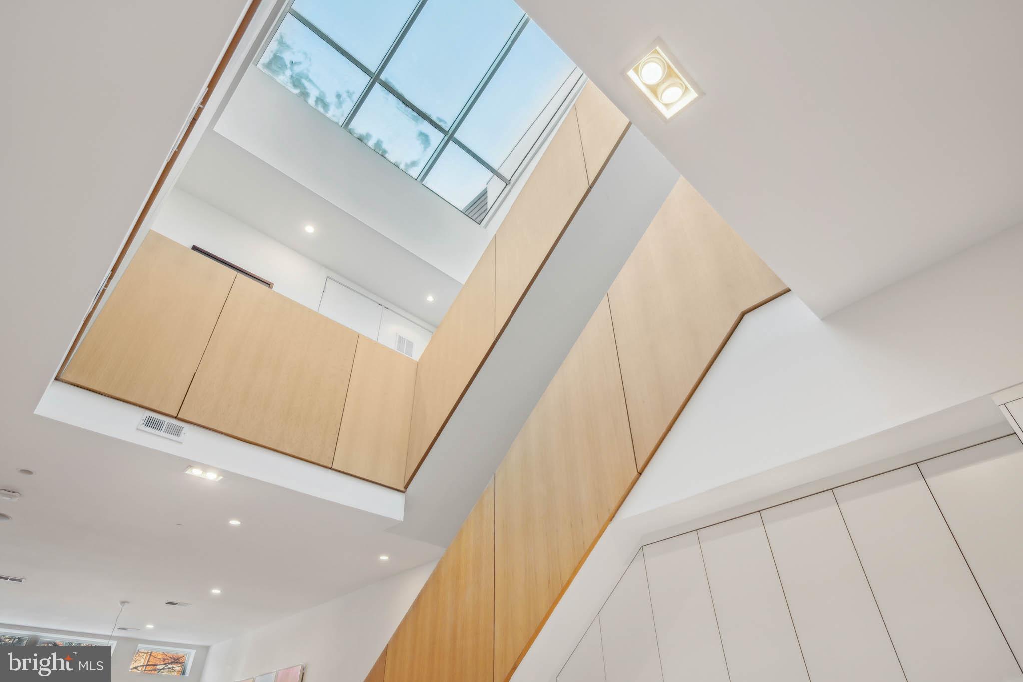 1325 Constitution Avenue Northeast Washington, DC 20002 - Photo 24 of 36 a view of staircase with railing and white walls