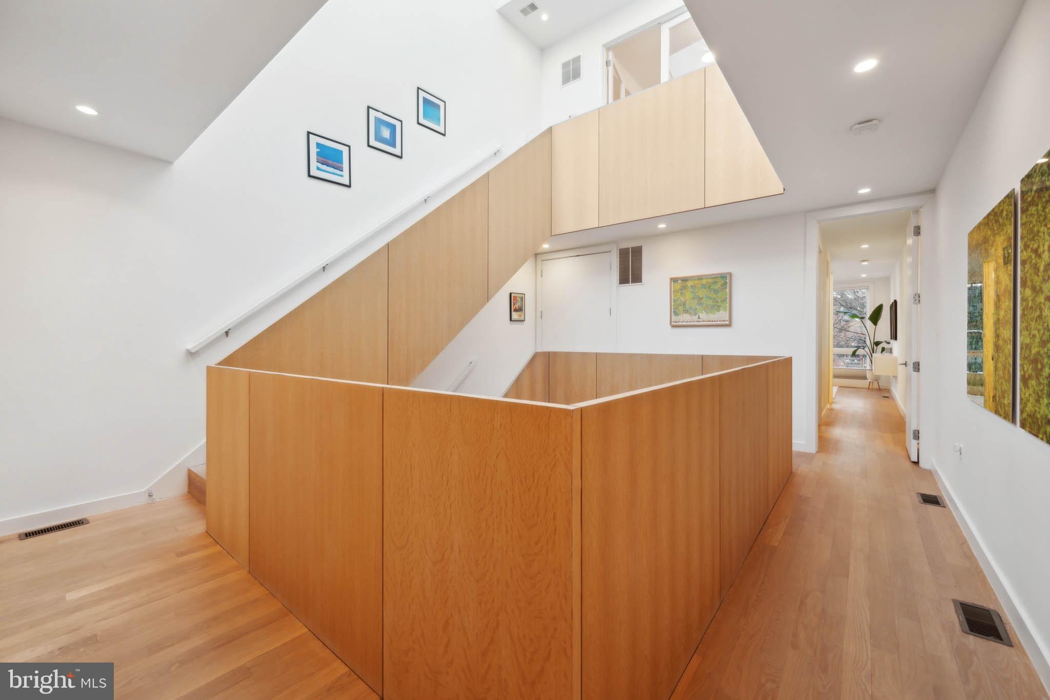1325 Constitution Avenue Northeast Washington, DC 20002 - Photo 25 of 36 a view of a kitchen with furniture and wooden floor