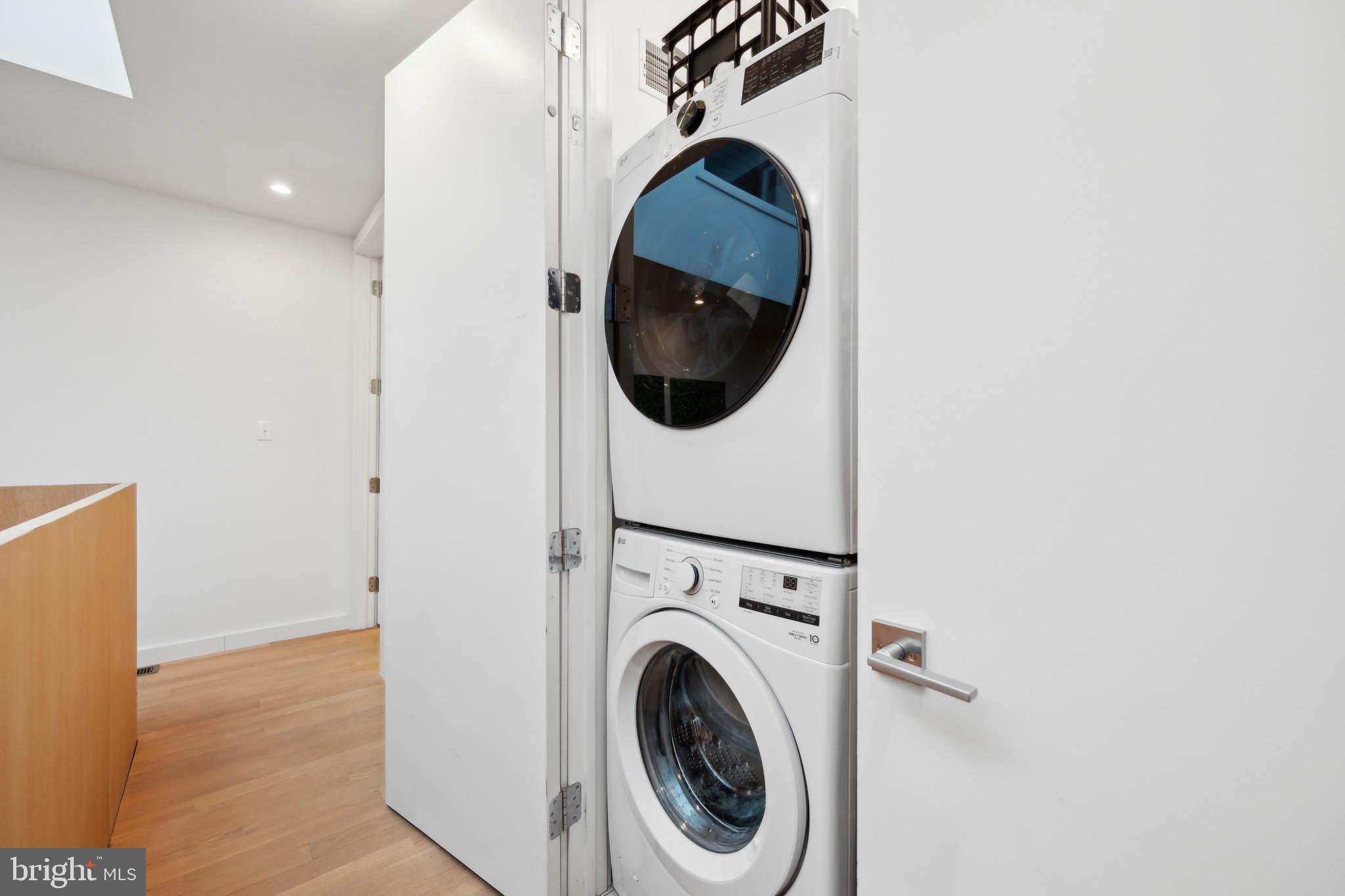 1325 Constitution Avenue Northeast Washington, DC 20002 - Photo 32 of 36 a close view of a utility room with dryer and washer