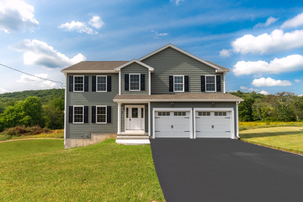 4 Upper Palmer Road Monson, MA 01057 - Photo 1 of 42 a front view of a house with a yard