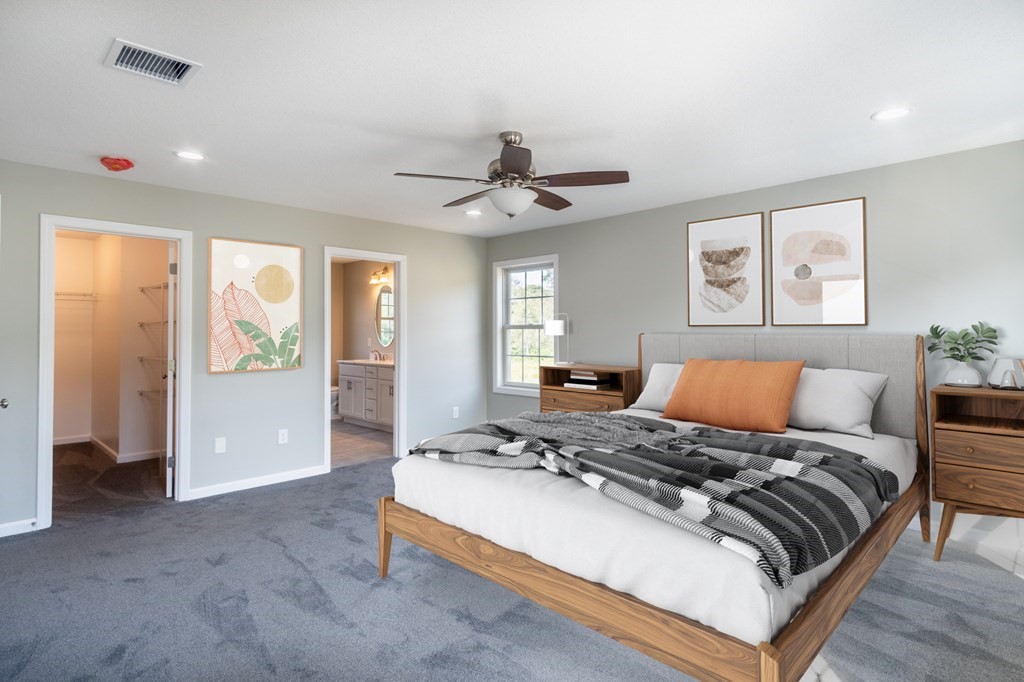 4 Upper Palmer Road Monson, MA 01057 - Photo 14 of 42 a bedroom with a large bed and a chandelier