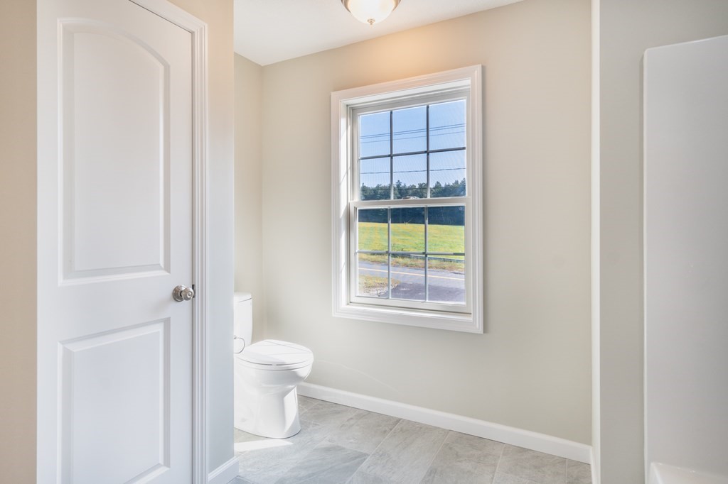 4 Upper Palmer Road Monson, MA 01057 - Photo 22 of 42 a bathroom with a toilet