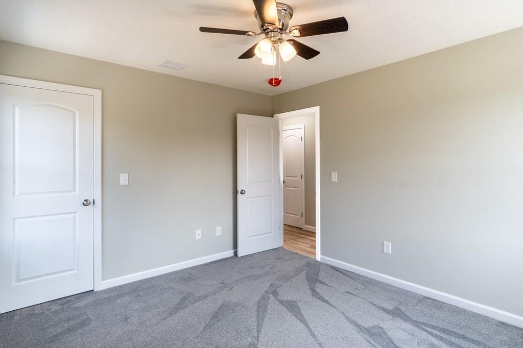 4 Upper Palmer Road Monson, MA 01057 - Photo 24 of 42 a view of a room with a ceiling fan and window
