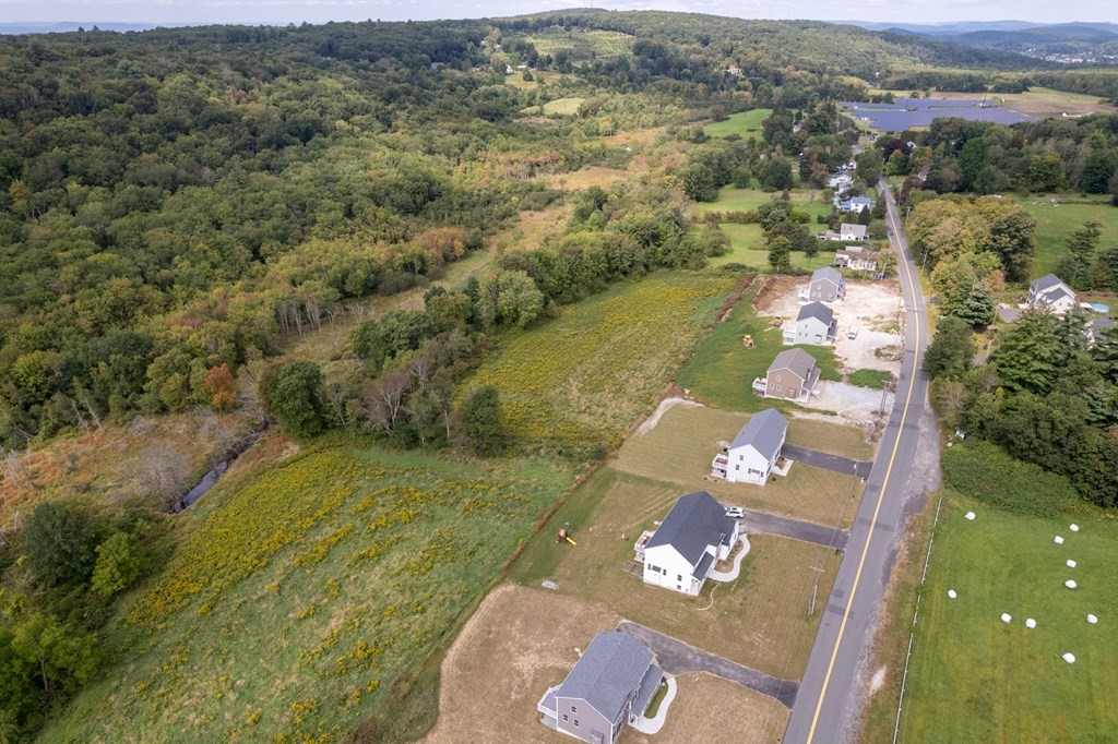 4 Upper Palmer Road Monson, MA 01057 - Photo 39 of 42 an aerial view of a house with a yard