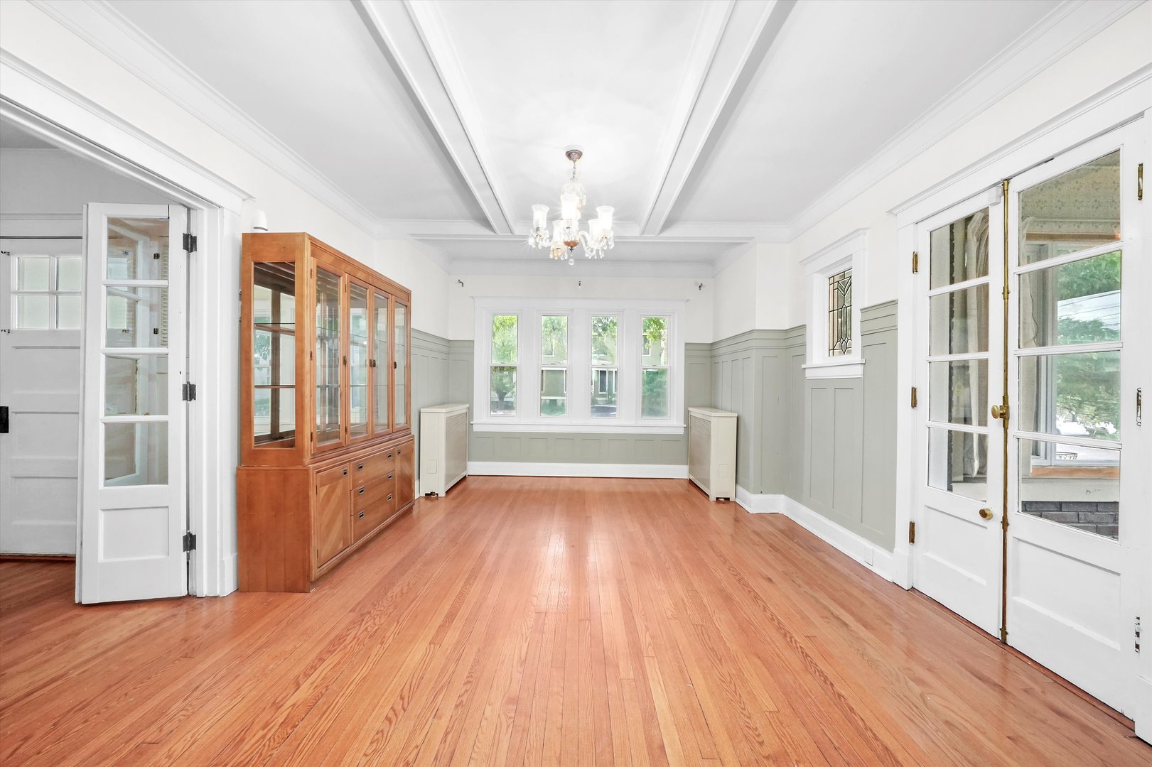 6822 34th Street Berwyn, IL 60402 - Photo 11 of 35 a view of an empty room with wooden floor and a window