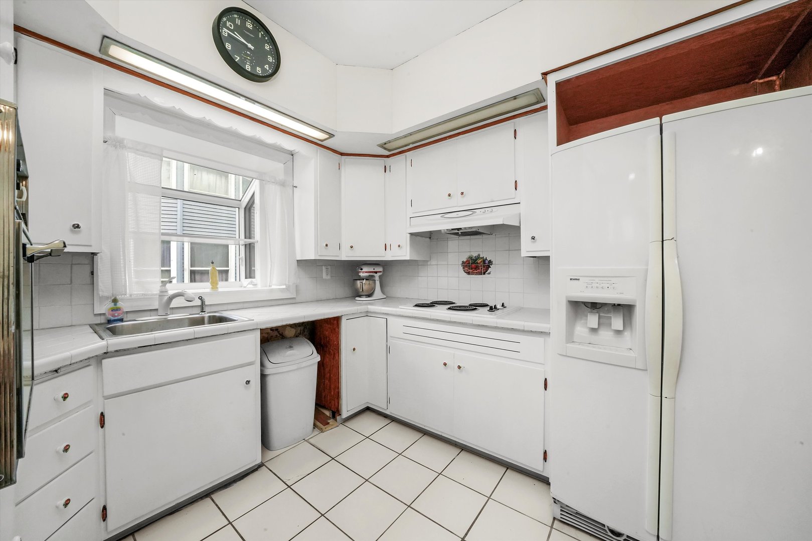 6822 34th Street Berwyn, IL 60402 - Photo 16 of 35 a kitchen with stainless steel appliances granite countertop a sink and cabinets
