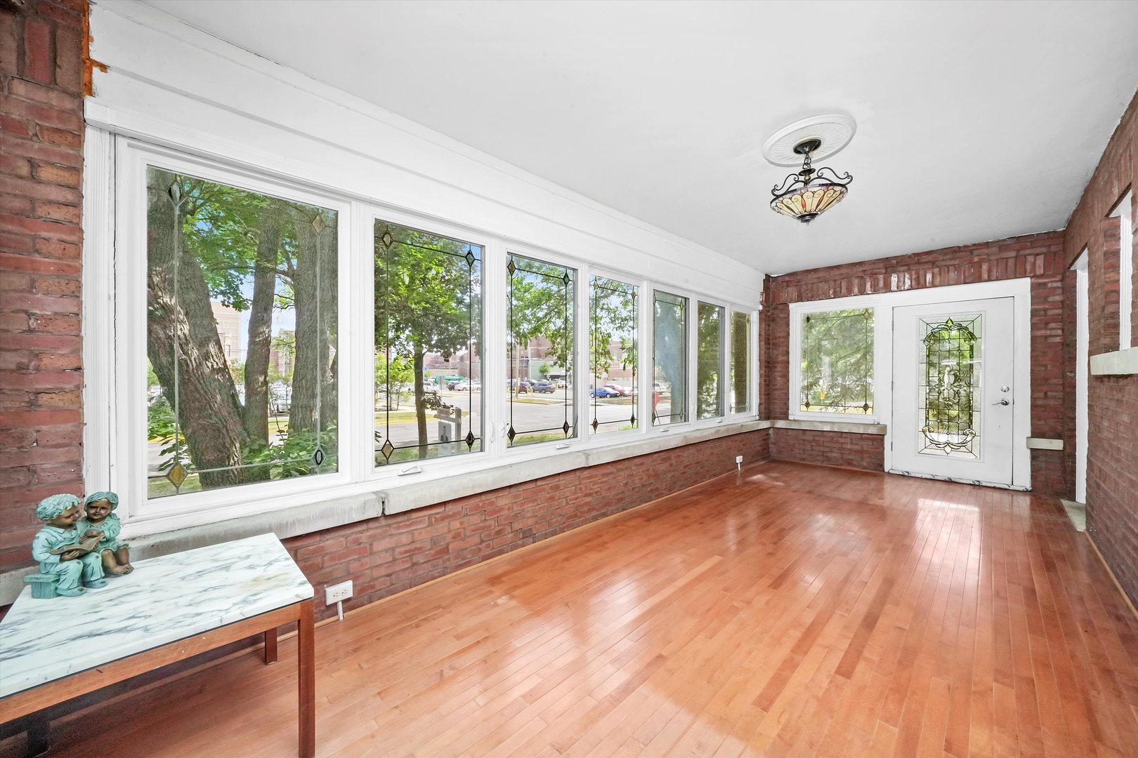 6822 34th Street Berwyn, IL 60402 - Photo 4 of 35 a view of a room with a large window