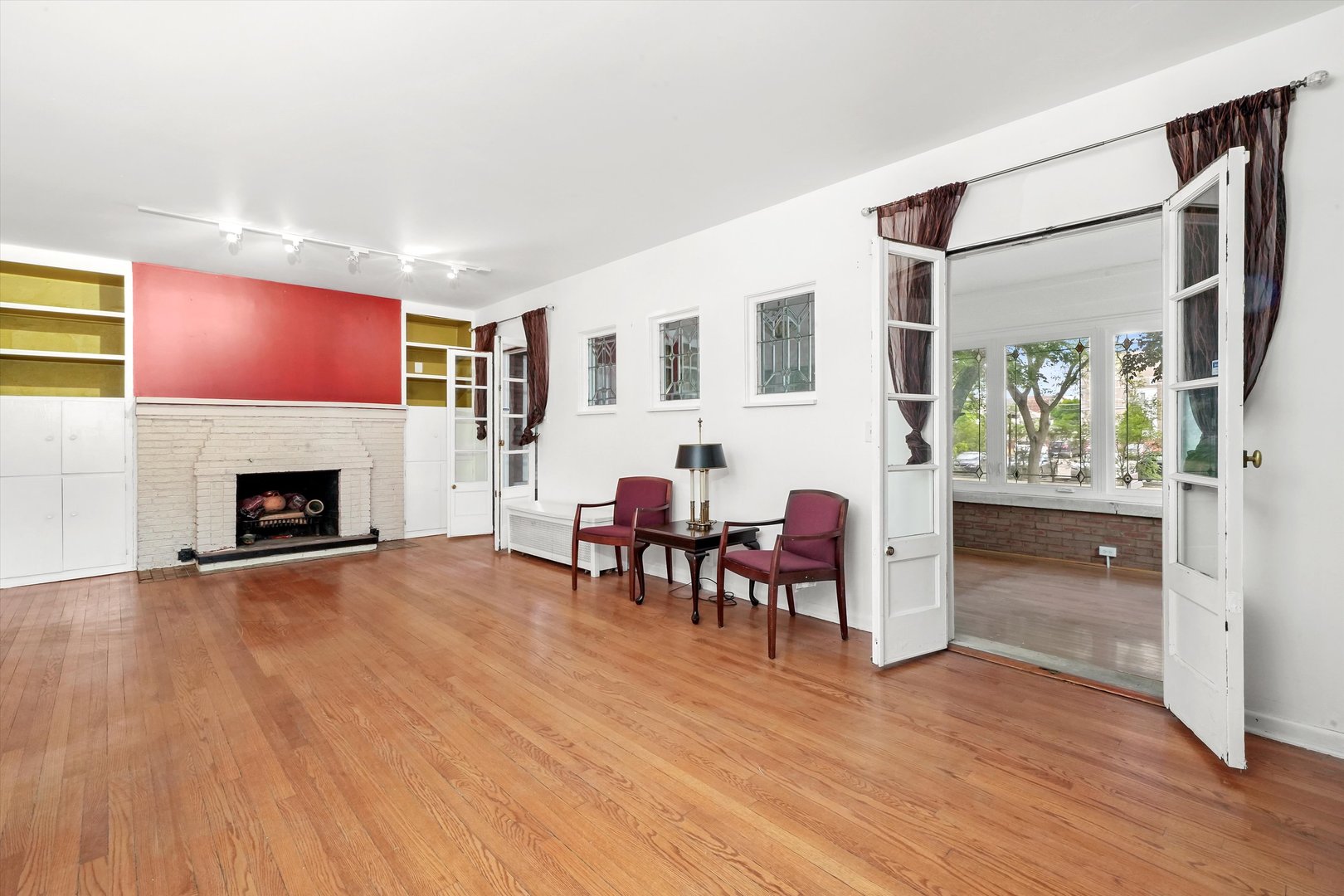 6822 34th Street Berwyn, IL 60402 - Photo 6 of 35 a living room with furniture and a fireplace