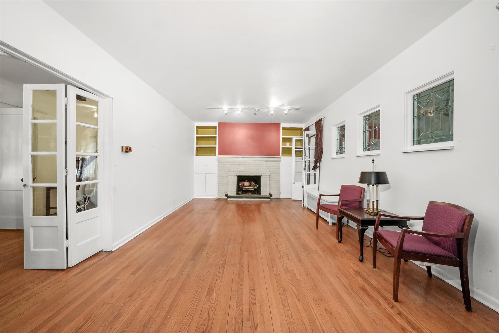 6822 34th Street Berwyn, IL 60402 - Photo 7 of 35 a living room with furniture and a fireplace