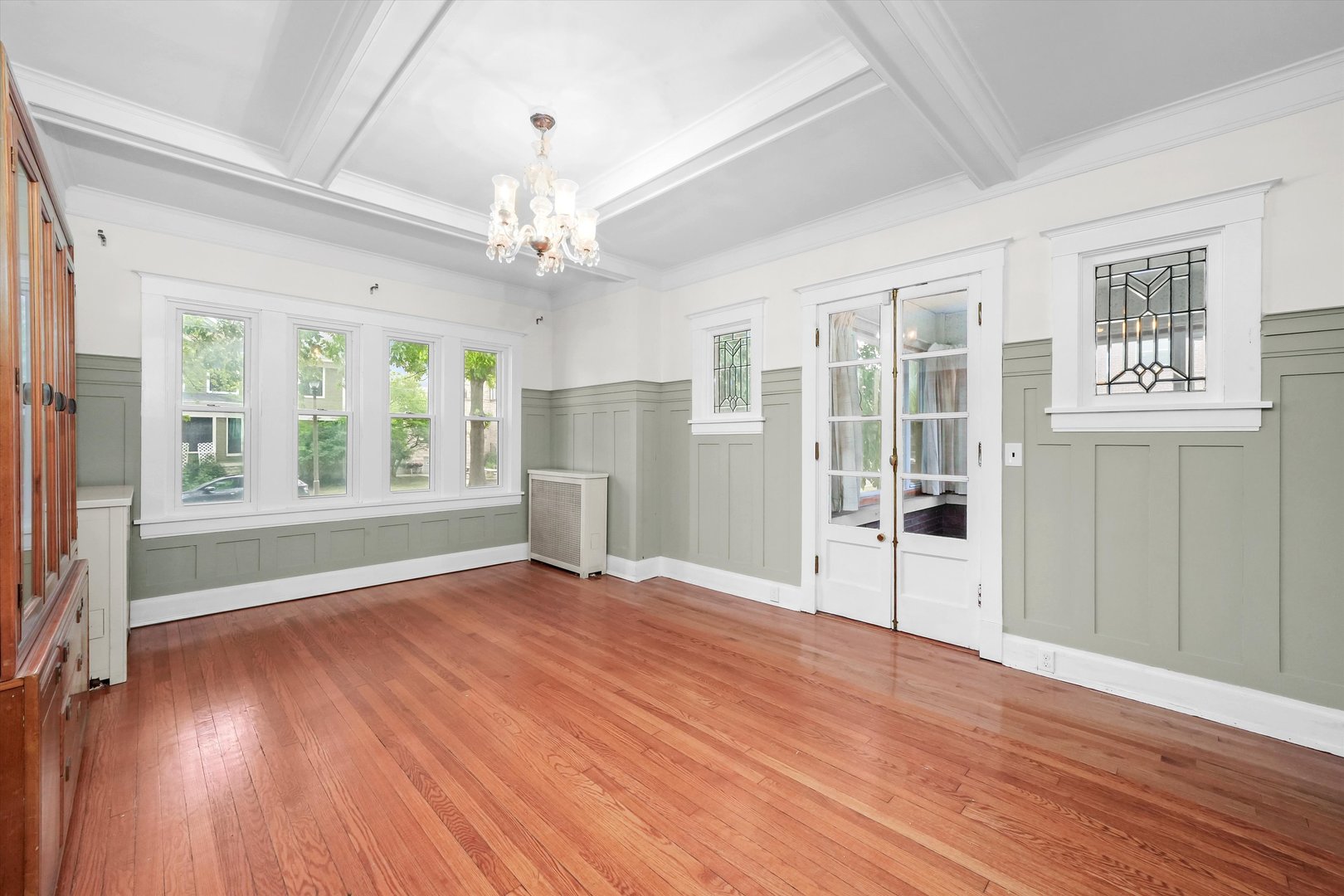 6822 34th Street Berwyn, IL 60402 - Photo 9 of 35 a view of an empty room with wooden floor and a window