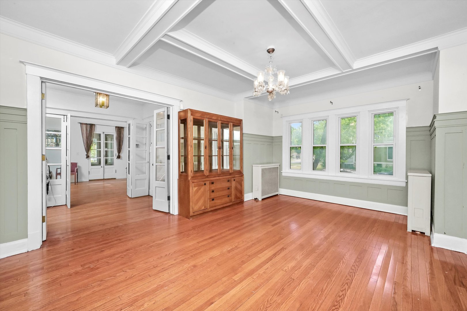 6822 34th Street Berwyn, IL 60402 - Photo 10 of 35 a view of an empty room with wooden floor and a window