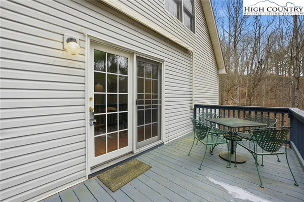 a view of a chairs on the deck