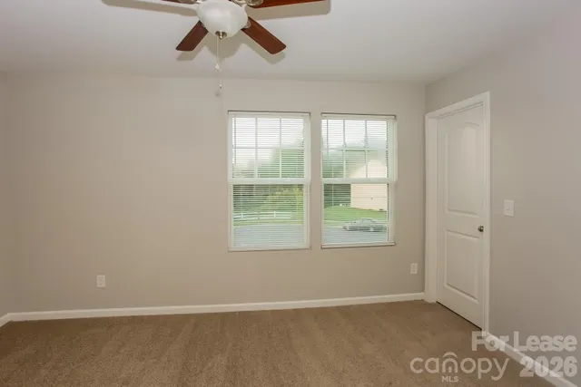 a view of a hallway with a closet