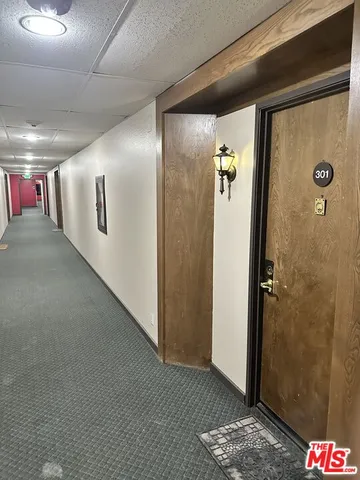 a very nice looking hallway with stairs
