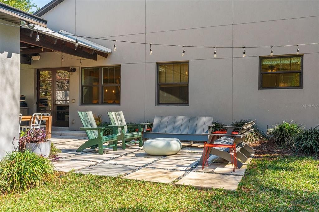 2501 Winter Park Road Winter Park, FL 32789 - Photo 35 of 63 a living room with patio furniture and potted plants