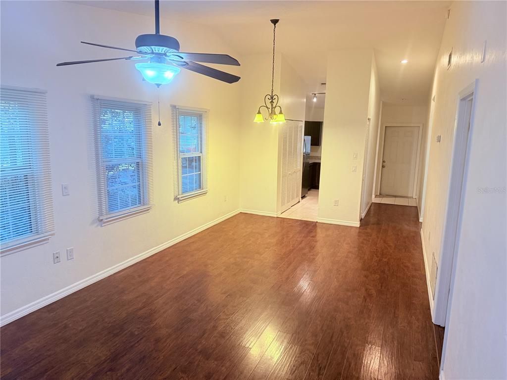 5134 Southwest 92nd Court Gainesville, FL 32608 - Photo 12 of 20 a view of empty room with wooden floor