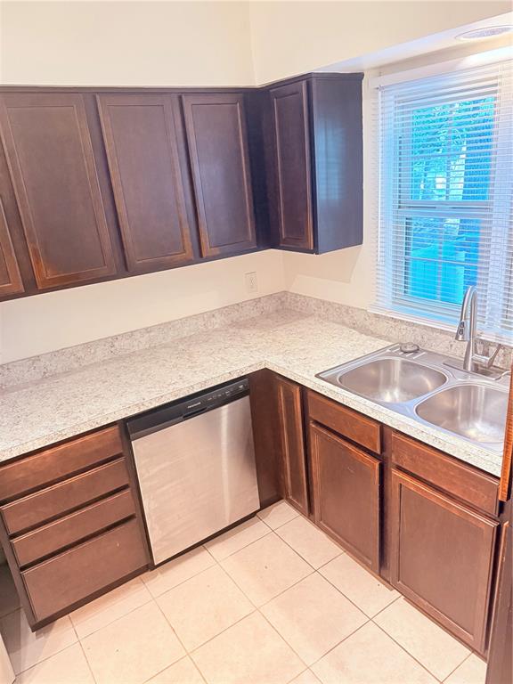 5134 Southwest 92nd Court Gainesville, FL 32608 - Photo 5 of 20 a kitchen with a sink and cabinets