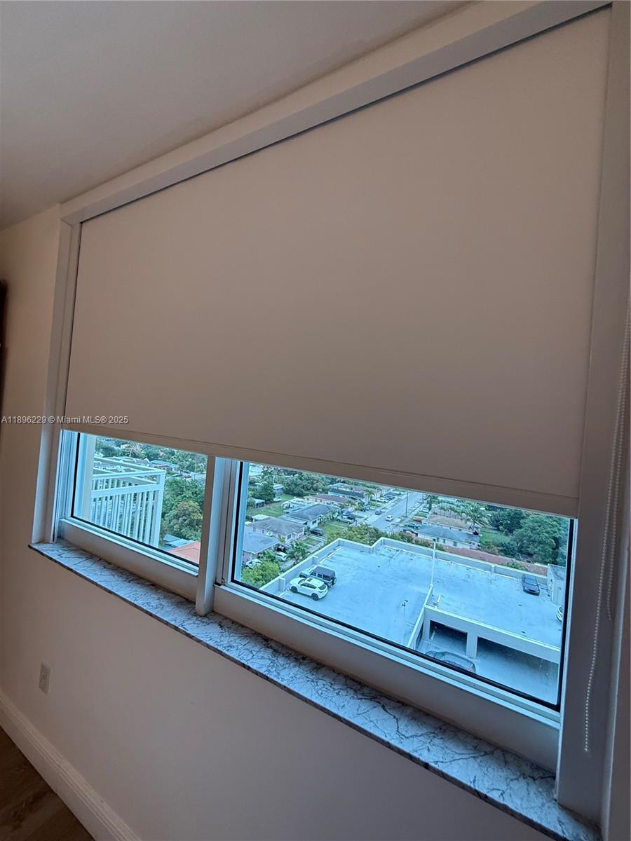 2665 Southwest 37th Avenue, Unit 1213 Miami, FL 33133 - Photo 36 of 54 a view of a two room with a window and outer view