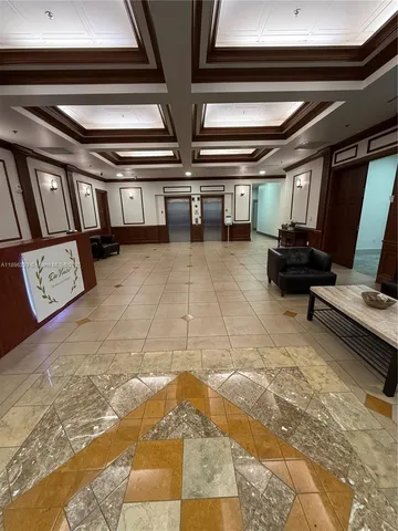 a view of livingroom with furniture