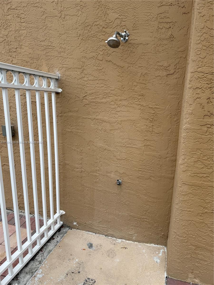2665 Southwest 37th Avenue, Unit 1213 Miami, FL 33133 - Photo 43 of 54 a bathroom with a shower