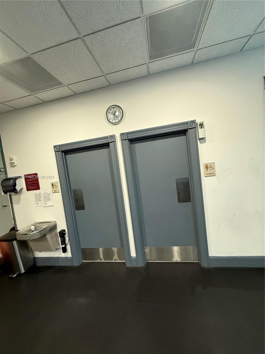 2665 Southwest 37th Avenue, Unit 1213 Miami, FL 33133 - Photo 52 of 54 a view of a room with gym equipment