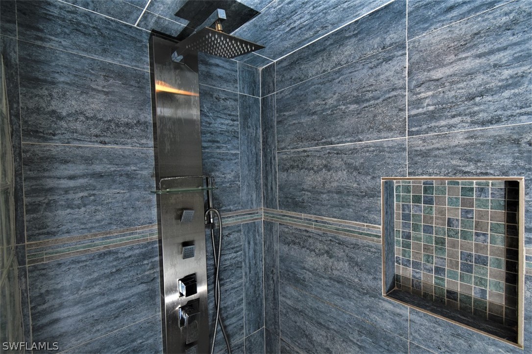 3170 Matecumbe Key Road, Unit 123 Punta Gorda, FL 33955 - Photo 15 of 25 a bathroom with a shower
