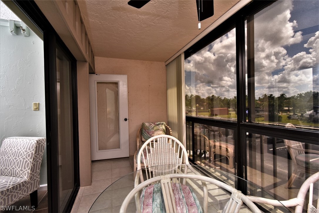 3170 Matecumbe Key Road, Unit 123 Punta Gorda, FL 33955 - Photo 18 of 25 a view of a balcony with furniture