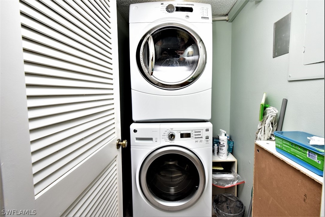 3170 Matecumbe Key Road, Unit 123 Punta Gorda, FL 33955 - Photo 20 of 25 a utility room with dryer and washer