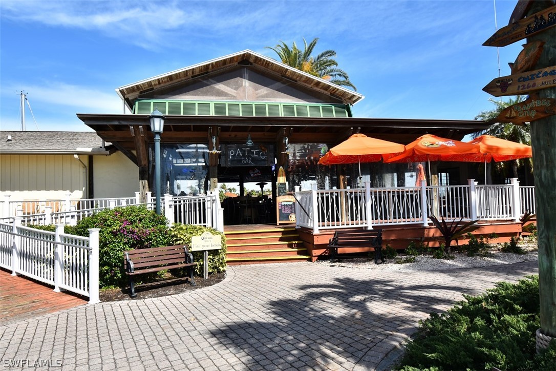 3170 Matecumbe Key Road, Unit 123 Punta Gorda, FL 33955 - Photo 25 of 25 a view of a cafe with sitting area