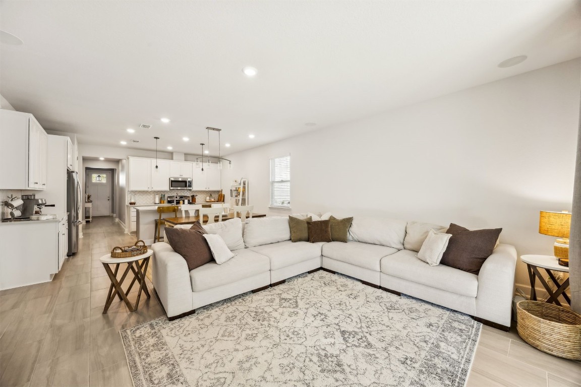 75968 Saffron Lane Yulee, FL 32097 - Photo 11 of 67 a living room with furniture and kitchen view