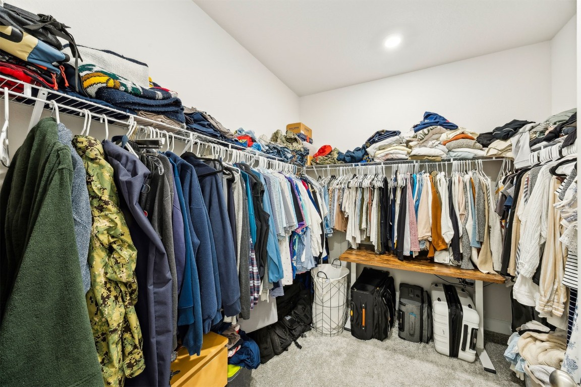 75968 Saffron Lane Yulee, FL 32097 - Photo 24 of 67 a view of walk in closet with clothes and shoes